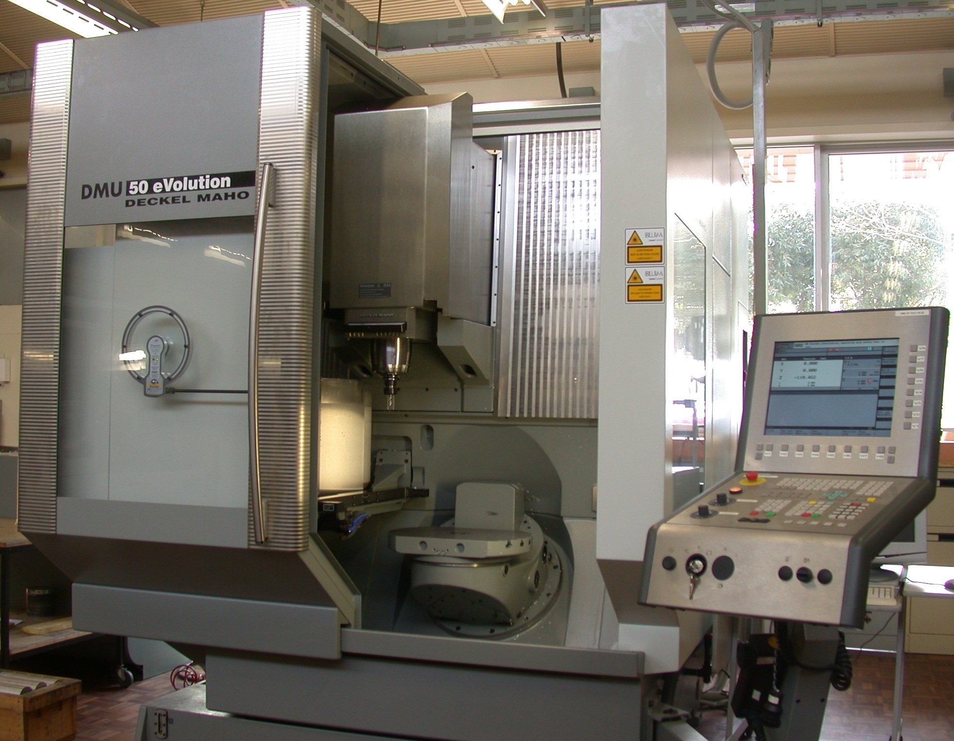 CNC machining center with control station