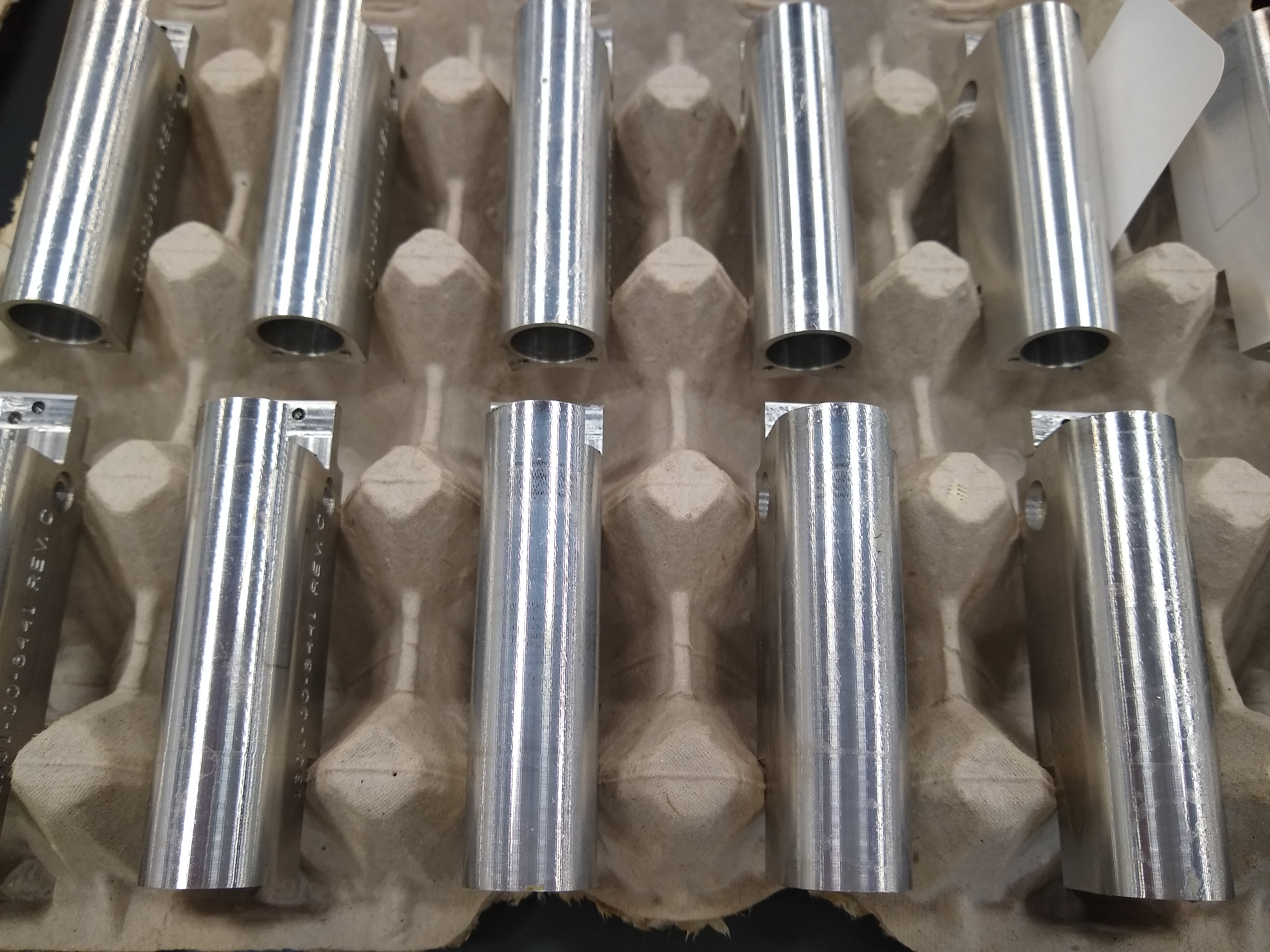 Tray of precision machined aluminum components